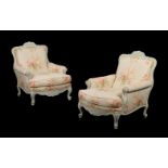 A PAIR OF FRENCH PAINTED AND UPHOLSTERED ARMCHAIRS IN LOUIS XV STYLE
