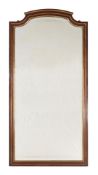 A MAHOGANY AND BRASS MOUNTED WALL MIRROR, PROBABLY BALTIC