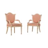 A PAIR OF CREAM PAINTED ARMCHAIRS