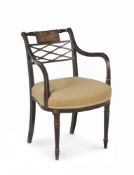 A REGNCY EBONISED AND PAINTED ELBOW CHAIR