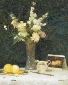λ PAUL RAYMOND SEATON (BRITISH B. 1953), STILL LIFE OF FLOWERS, LEMONS, SILVERWARE AND A POSTCARD