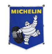 An enamel vehicle tyre advertising sign of MICHELIN MAN " BIBENDUM "