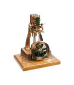 An exhibition standard model of a vertical live steam stationary engine