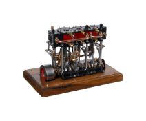 An exhibition standard model of a triple marine engine