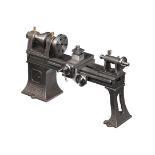 A Stuart model of a flat belt driven engineering lathe