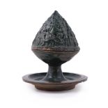 A rare Chinese green-glazed 'mountain' form censer (boshanlu)