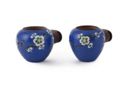 A pair of Chinese enamelled yixing bird feeders