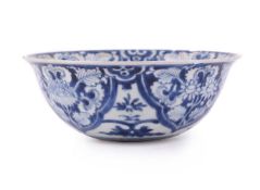 A Chinese blue and white soft-paste 'flower' bowl