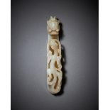 A Chinese white or very pale celadon jade belt hook