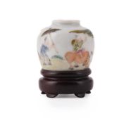 A small enamelled porcelain vase