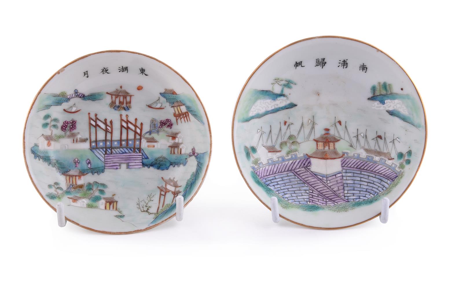 A pair of Chinese famille rose 'Scenes of Jiangxi' saucers