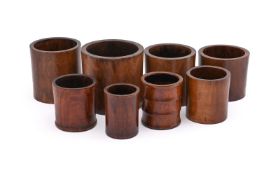 A group of eight huanghuali brushpots
