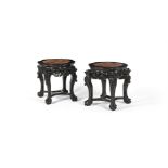 A pair of Chinese Hongmu and marble topped stands