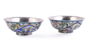 A good pair of Chinese silver and enamel 'Dragon' bowls