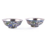 A good pair of Chinese silver and enamel 'Dragon' bowls