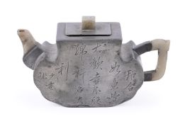 A Chinese jade inlaid pewter teapot