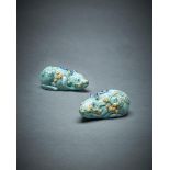 A pair of Dutch Delft light blue glazed models of 'tree shrews'