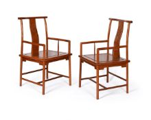 A pair of Chinese Huanghuali arm chairs