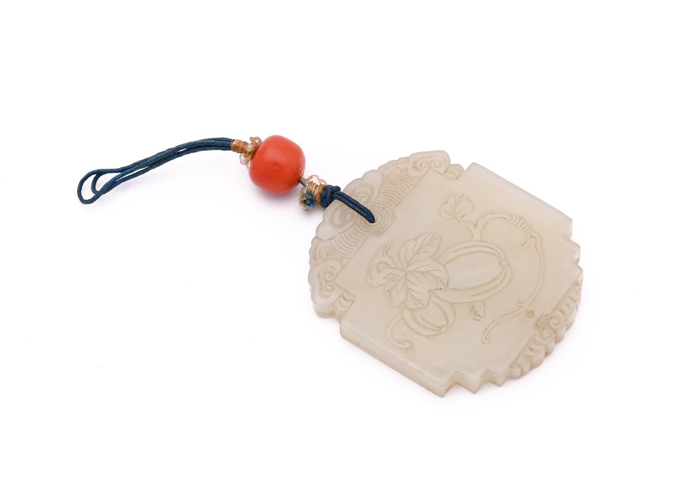 A Chinese pale celadon pendant