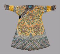 A rare Chinese Imperial golden-yellow 'Dragon' robe made for a consort to the Emperor
