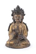 A Chinese gilt-bronze figure of Guanyin