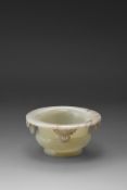 A Chinese white and russet jade 'Marriage' bowl