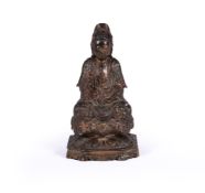 A Chinese lacquered camphor wood guanyin