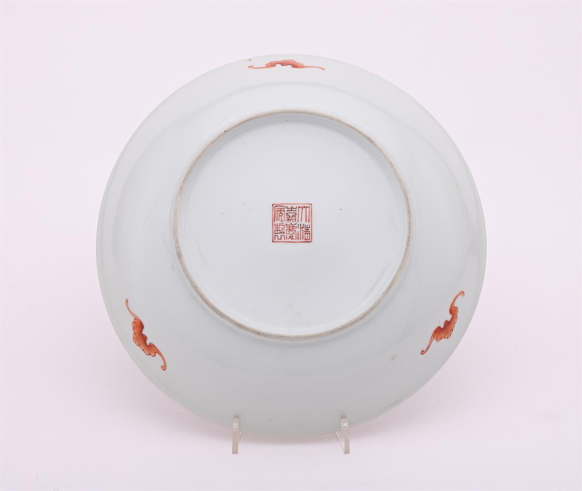 A rare Chinese iron-red 'bat' saucer dish - Image 3 of 3