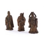 Three Chinese cast-iron models of Deities