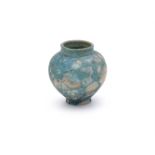An Kashan type fritware turquoise glazed vase