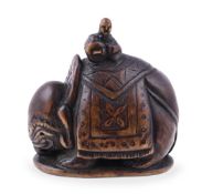 Hara Shumin: A Japanese Boxwood Netsuke depicting a richly caparisoned elephant