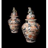 A pair of Japanese Imari vases and covers