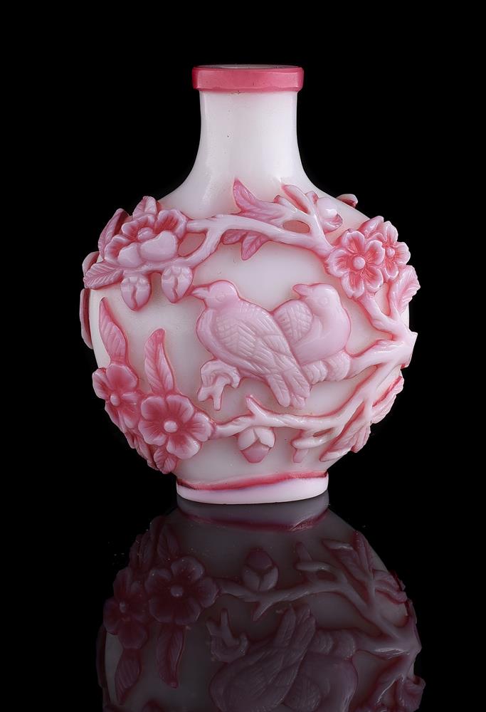 A Chinese pink and milky-white double-overlay glass snuff bottle