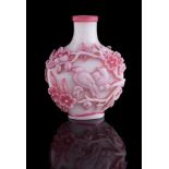 A Chinese pink and milky-white double-overlay glass snuff bottle