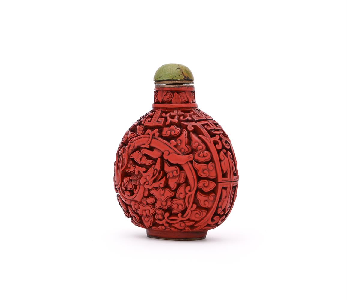 A Chinese cinnabar snuff bottle - Image 2 of 4