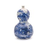 A Japanese blue and white double gourd vase