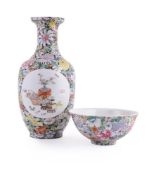 A Chinese famille noire 'Mille fleur' vase and a bowl