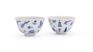 A pair of Chinese blue and white 'Daoist Emblems' tea bowls