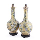 A pair of Chinese cloisonné yellow-ground vases