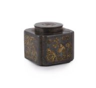 A Chinese brass inlaid pewter inkwell and cover