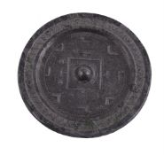 A Chinese silver-coloured bronze mirror