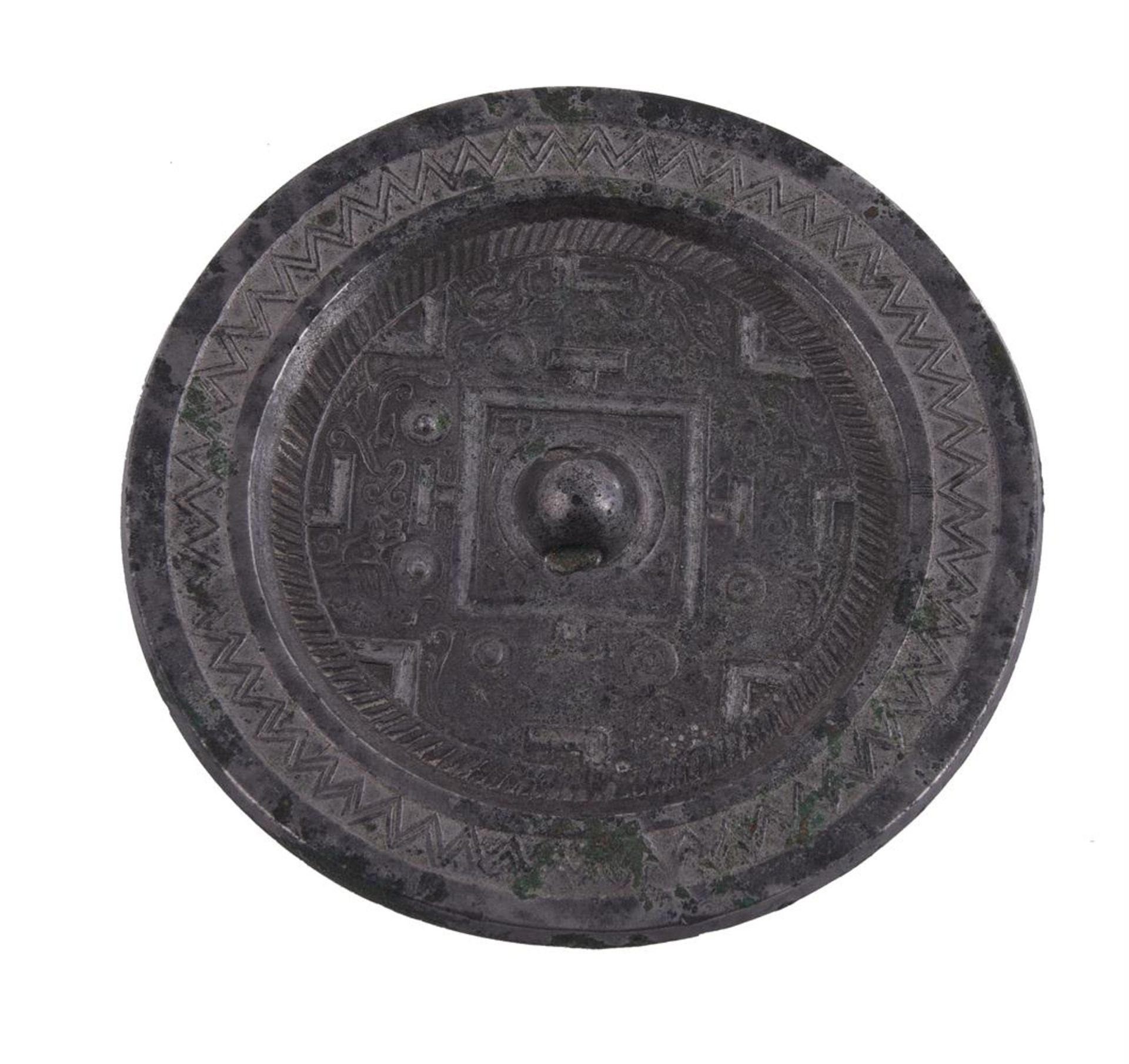 A Chinese silver-coloured bronze mirror