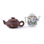 A Chinese Yixing surface 'marbled' teapot and cover
