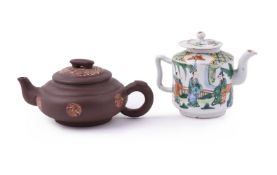 A Chinese Yixing surface 'marbled' teapot and cover