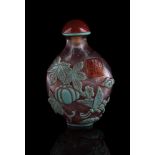 A Chinese green overlay glass snuff bottle