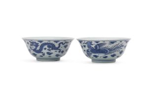A pair of Chinese blue and white 'Dragon and Phoenix' bowls