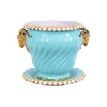A MINTON MAJOLICA JARDINIERE AND STAND