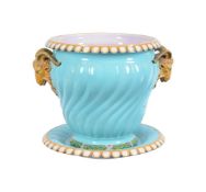 A MINTON MAJOLICA JARDINIERE AND STAND