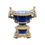 A MINTON MAJOLICA WINE COOLER AND STAND