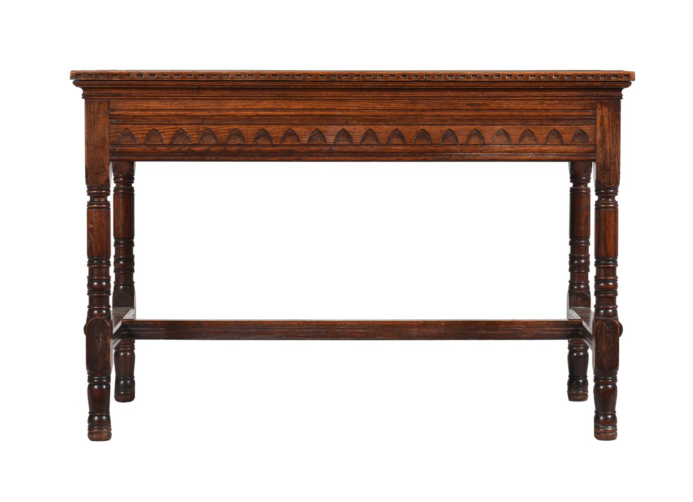 A REFORMED GOTHIC OAK SIDE TABLE ATTRIBUTED TO BRUCE TALBERT